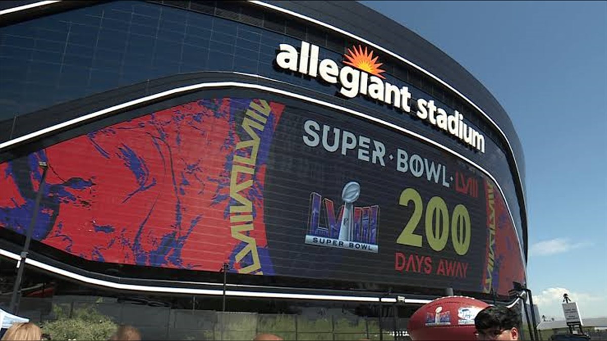 Allegiant Stadium Exterior Biggest LED Screen Project LED Display Manufacturer in China EagerLED Exterior view of Allegiant Stadium with a curved facade and the allegiant stadium sign featuring a large LED display advertising the Super Bowl LVII and 200 days away