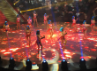 Performers dancing on a large Floor LED Display stage