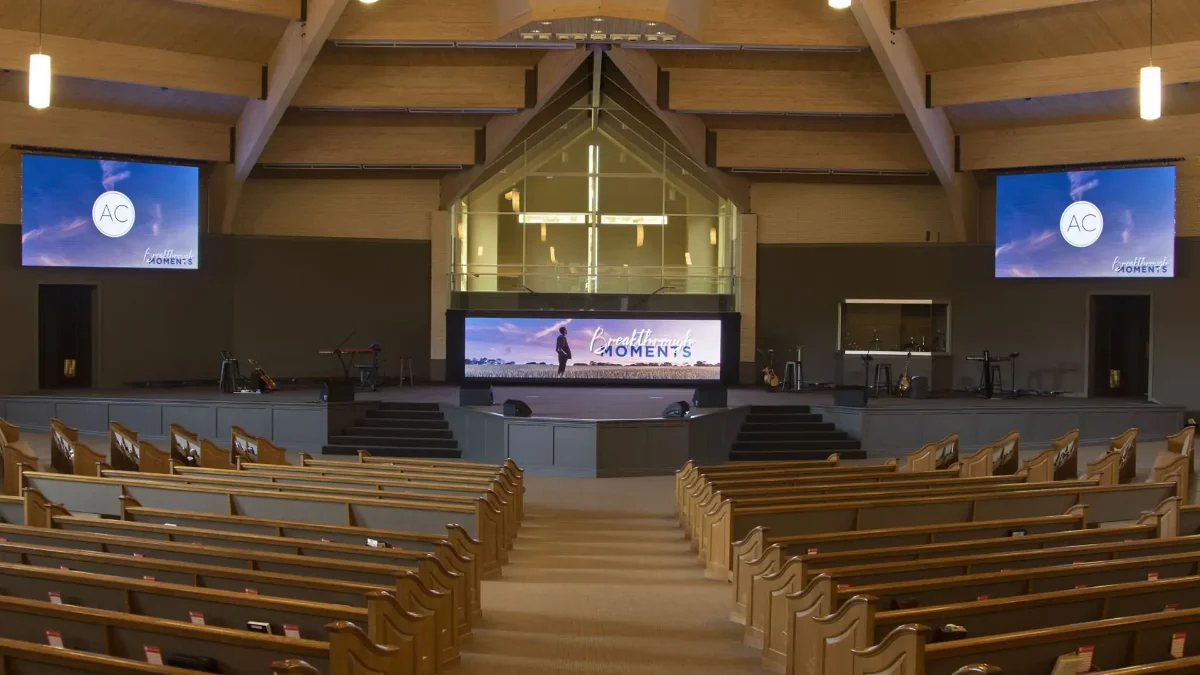 Church sanctuary with pew seating two side displays and a central stage screen LED Display Manufacturer in China EagerLED Church sanctuary with pew seating two side displays and a central stage screen