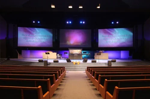 Church stage with lyric screens a central background display and purple lighting LED Display Manufacturer in China EagerLED Church stage with lyric screens a central background display and purple lighting