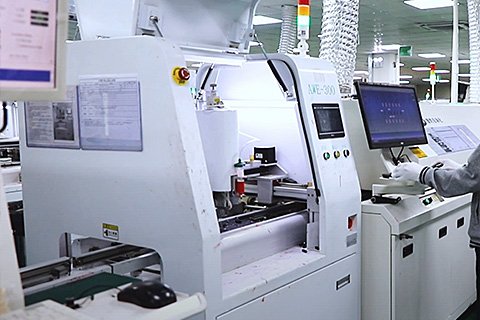 SMT production line placing components on LED module PCBs at the EagerLED factory in Shenzhen