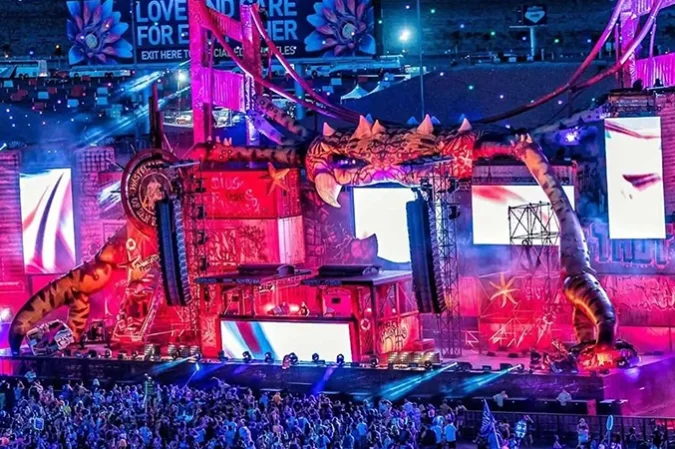 Concert stage with several LED video surfaces and an audience